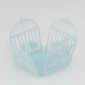 Detail view of light blue laser-cut birdcage candy box for wedding party favors