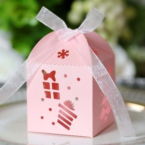 Detailed laser-cut pink gift box with snowflake cutout and white organza ribbon bow