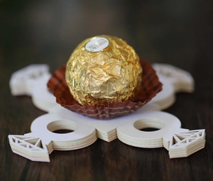 Detailed laser-cut diamond ring candy holder with delicate hollow lace patterns