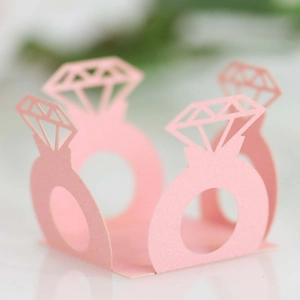 Pink laser-cut wedding favor box with diamond ring motif and lace hollow decoration