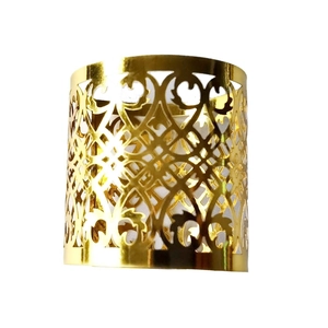 Golden hollow cylindrical napkin ring with geometric floral cut-outs for wedding party decor