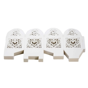 Laser cut heart shaped favor boxes in white pearl paper for wedding candy packaging