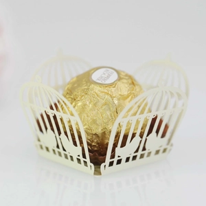 Detailed laser-cut white birdcage candy holder for wedding and party favor decorations