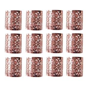 Set of 12 rose gold metal napkin rings with intricate geometric hollow cutout design