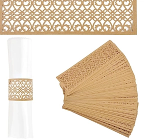 Detail of laser-cut heart pattern paper napkin ring for elegant wedding table decor