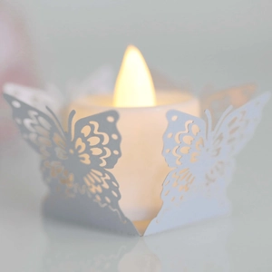 Macro d'abat-jour papillon en dentelle découpée au laser avec bougie LED chaleureuse
