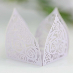 Detail of light purple laser-cut rose paper wrapper with elegant pearlescent texture