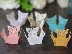 Laser-cut butterfly hollow candy boxes in various colors for weddings and parties