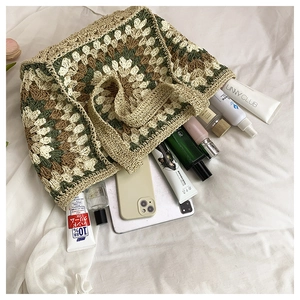 Detail view of woven crochet tote bag showing interior storage for daily cosmetics