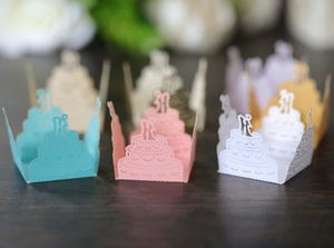 Detailed laser cut tiered cake gift boxes with couple silhouettes in multiple colors
