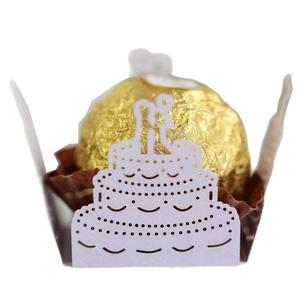 Laser cut white wedding cake chocolate wrapper holder with bride and groom silhouette