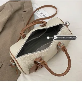 Interior view of the two-tone bowling bag showing pockets and lining structure