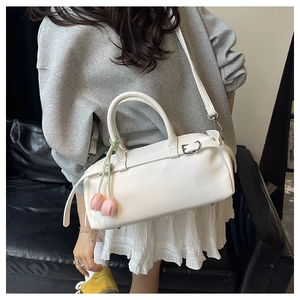 White lychee pattern Boston handbag with a pink tulip charm and detachable strap