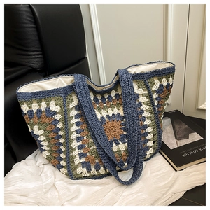 Detailed macro view of granny square crochet tote bag with durable cotton linen lining