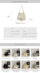 Detail showing bucket bag dimensions and leather texture for multi-way carry styles