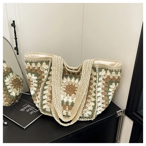 Detailed close-up of handmade crochet tote bag featuring sunflower pattern in bohemian style