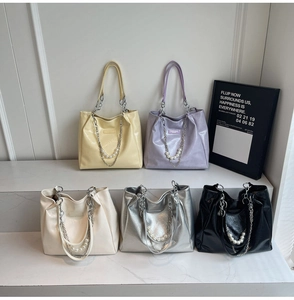 Collection of vibrant tote bags in five colors with pearl and metal chain details