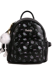 Mini zaino nero con motivo floreale viola e portachiavi con palla di peluche bianca