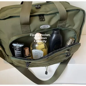Close-up of olive green travel bag front zipper pocket showing spacious internal storage