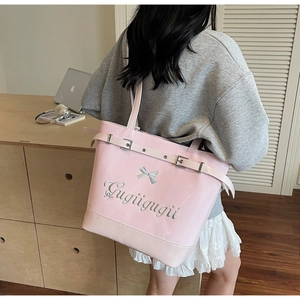 Sac cabas en cuir verni rose avec nœud argenté et broderie détaillée Gugügugii