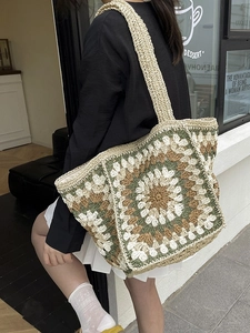 Ethnic crochet knit tote bag with floral mandala pattern and wide shoulder strap