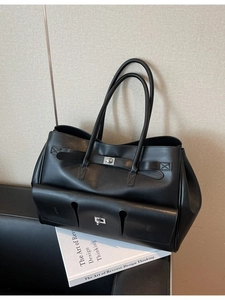 Black large capacity faux leather tote bag with multi-pocket design and metal buckles