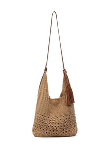 Handwoven straw shoulder bag with floral hollow pattern and brown leather strap with tassel