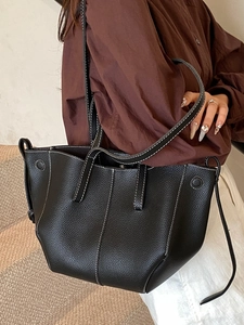 French style black litchi grain tote bag with white contrast stitching and wide strap