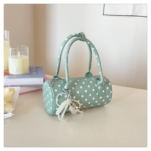 Sac à main cylindrique vert clair à pois avec charme nœud perle et poignées doubles