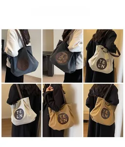 Three colors of large canvas tote bags shown in a multi-angle model styling display