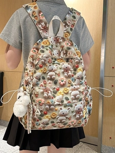 Cute 3D cartoon bear backpack for students with large capacity and floral patterns