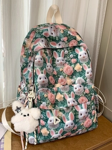Cute school backpack with rabbit floral print, large capacity and plush bunny charm