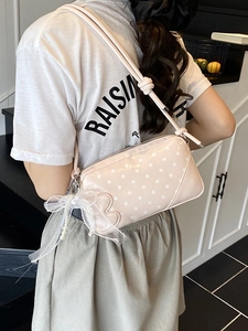 Petit sac à bandoulière rose à pois avec nœud en tulle et breloque perle