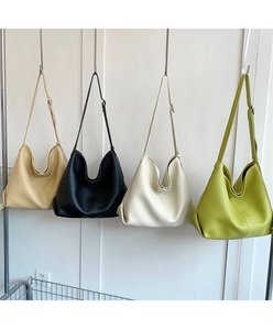 Minimalist hobo bags in apricot, black, beige, and green with lychee leather texture