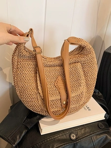 Casual woven straw half-moon bag in light brown with faux leather strap for women