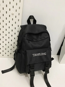 Harajuku style black canvas backpack with white embroidery and buckle straps for students