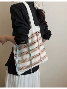 Knit tote bag with cream and brown stripes, hollow crochet pattern and colorful tassels