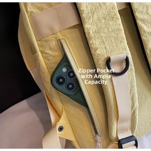Detail of backpack back security zipper pocket with wrinkle-textured waterproof fabric