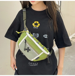 Outdoor street style green chest bag with black mesh pocket and adjustable strap