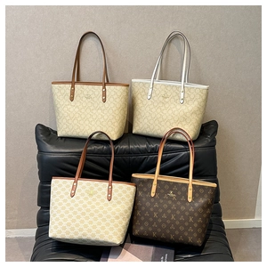 Selection of large tote bags in various monogram prints and elegant neutral tones