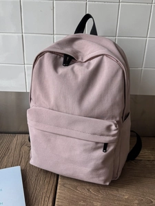 Minimalist solid color large capacity backpack for students in soft dusty pink nylon