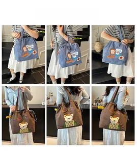 Lifestyle views of a checkered canvas tote bag and embroidered bear drawstring shoulder bag
