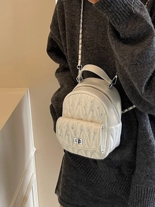 Quilted white mini backpack with shiny rhinestones and silver chain strap for women