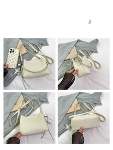 Vue détaillée sous quatre angles d'un sac seau beige en cuir avec pendentif étoile