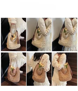 Detail of woven straw shoulder bag with long tassel charms and large capacity