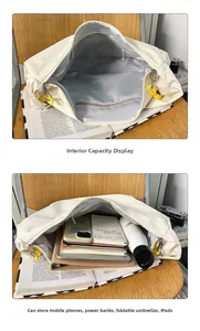 Detailed view of spacious interior with zipper pocket in a beige canvas tote bag