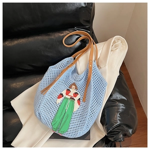 Detailed knit tote bag with cartoon girl embroidery and brown leather shoulder straps