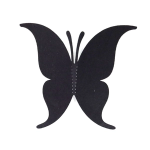 Détail d'un papillon 3D adhésif montrant la texture du tissu et la couture centrale blanche