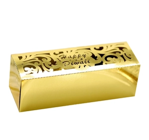 Detail of laser-cut Happy Diwali golden mirror gift box with floral patterns