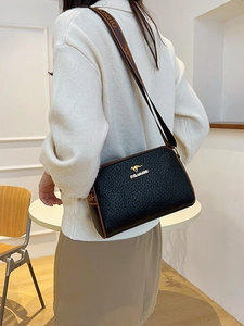 Fashion woven Boston bag in black with brown trim and stylish wide branded strap